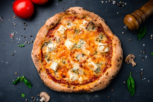 Quais são os queijos da pizza 4 queijos? Aprenda a combinação perfeita